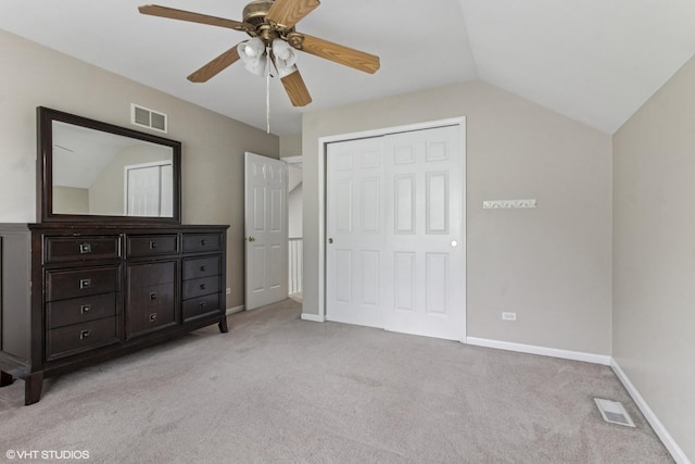 1110 Natalie Dr, West Chicago, IL 60185 - unfurnished bedroom featuring light colored carpet, lofted ceiling, a closet, and ceiling fan