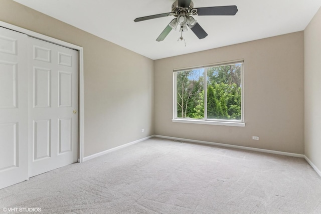 1110 Natalie Dr, West Chicago, IL 60185 - unfurnished bedroom featuring carpet flooring and a ceiling fan