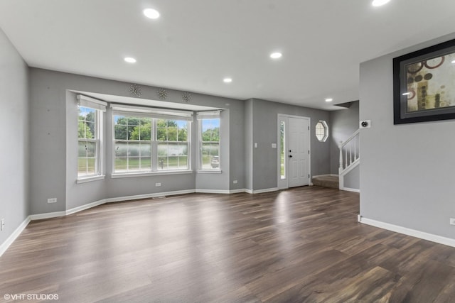 1110 Natalie Dr, West Chicago, IL 60185 - unfurnished living room with stairway, recessed lighting, and wood finished floors