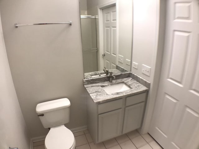 948 W 15th Pl Unit 1B, Chicago, IL 60608 - bathroom with vanity, tile patterned floors, and an enclosed shower