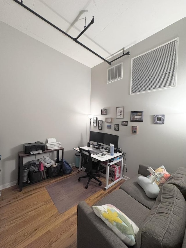 1224 W Van Buren St Unit 506, Chicago, IL 60607 - office area with wood finished floors and a garage