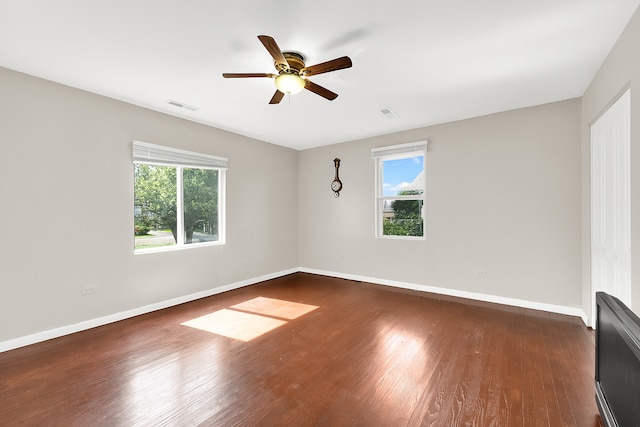 15929 Lorel Ave, Oak Forest, IL 60452 - unfurnished room with plenty of natural light, a ceiling fan, and dark wood-type flooring