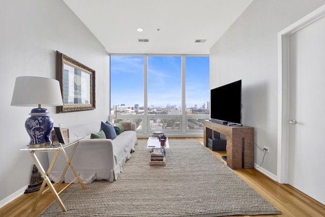 500 W Superior St Unit 1004, Chicago, IL 60654 - living area with expansive windows and wood finished floors