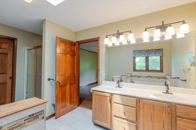 201 N Broadway St, Hudson, IL 61748 - bathroom with a stall shower, a bath, tile patterned floors, and double vanity