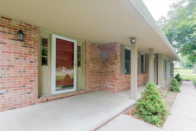 201 N Broadway St, Hudson, IL 61748 - entrance to property with brick siding