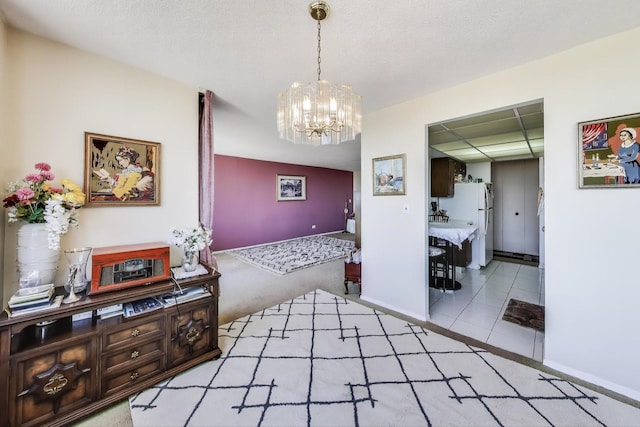 3925 Triumvera Dr Unit 14D, Glenview, IL 60025 - dining area featuring a chandelier and light tile patterned floors