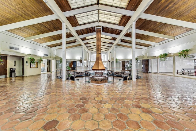 3925 Triumvera Dr Unit 14D, Glenview, IL 60025 - community lobby featuring high vaulted ceiling and a wooden ceiling with exposed beams
