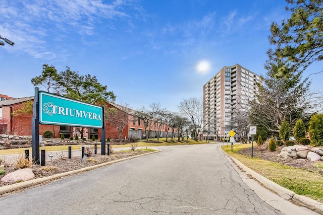 3925 Triumvera Dr Unit 14D, Glenview, IL 60025 - view of asphalt street with traffic signs and curbs