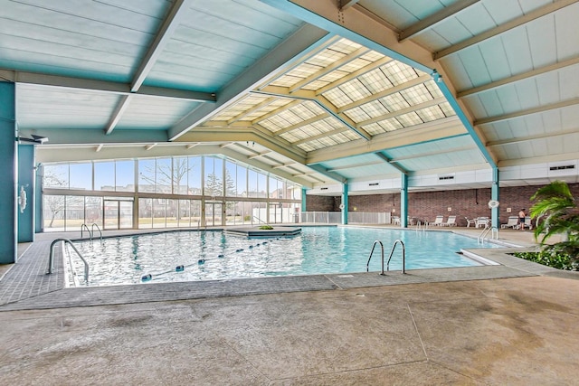 3925 Triumvera Dr Unit 14D, Glenview, IL 60025 - indoor community pool featuring a patio