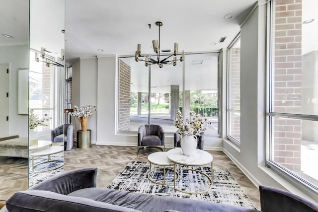 3925 Triumvera Dr Unit 14D, Glenview, IL 60025 - living room featuring a chandelier and baseboards