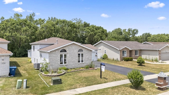 22514 Plum Creek Dr, Sauk Village, IL 60411 - ranch-style house with brick siding and a front lawn