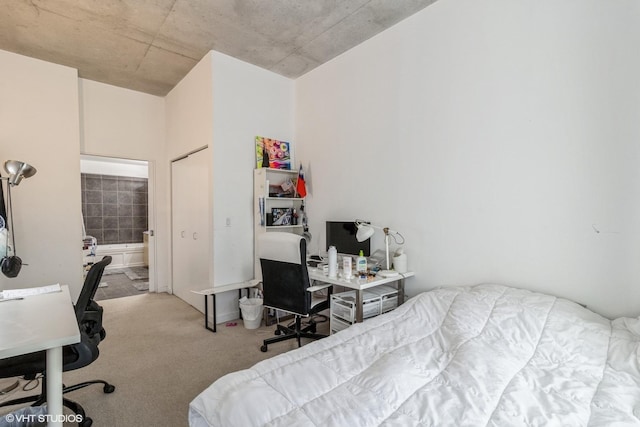 235 W Van Buren St Unit 1705, Chicago, IL 60607 - bedroom with an office area, carpet floors, and ensuite bath