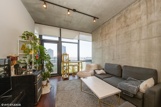 235 W Van Buren St Unit 1705, Chicago, IL 60607 - living area featuring dark wood-type flooring, track lighting, and a wall of windows