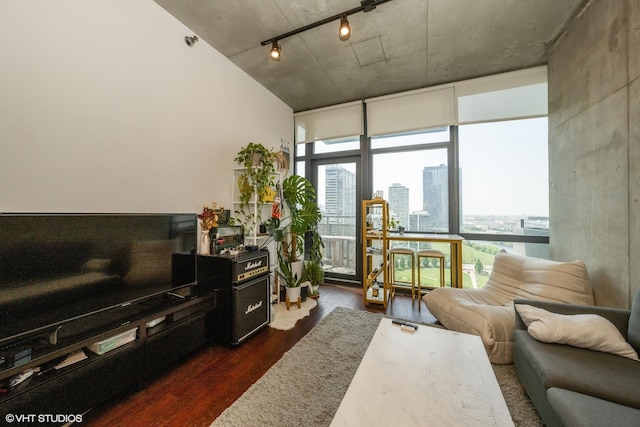 235 W Van Buren St Unit 1705, Chicago, IL 60607 - living area featuring dark wood-type flooring, a view of city, a wall of windows, healthy amount of natural light, and rail lighting