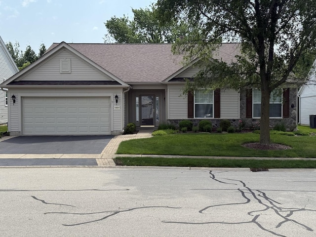 312 Honors Dr, Shorewood, IL 60404 - ranch-style home with a shingled roof, asphalt driveway, a garage, and a front lawn