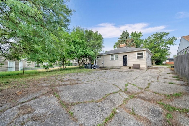 17841 Lorenz Ave, Lansing, IL 60438 - rear view of house with a chimney