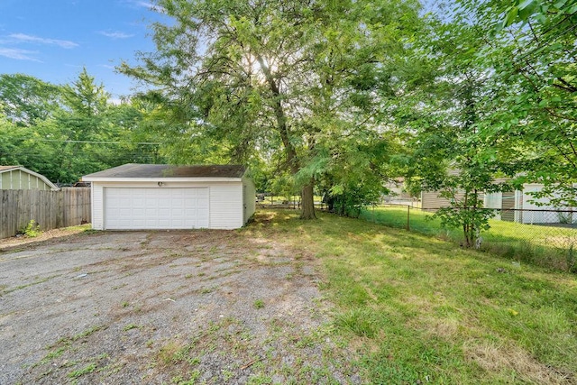 17841 Lorenz Ave, Lansing, IL 60438 - fenced backyard featuring an outbuilding and a garage