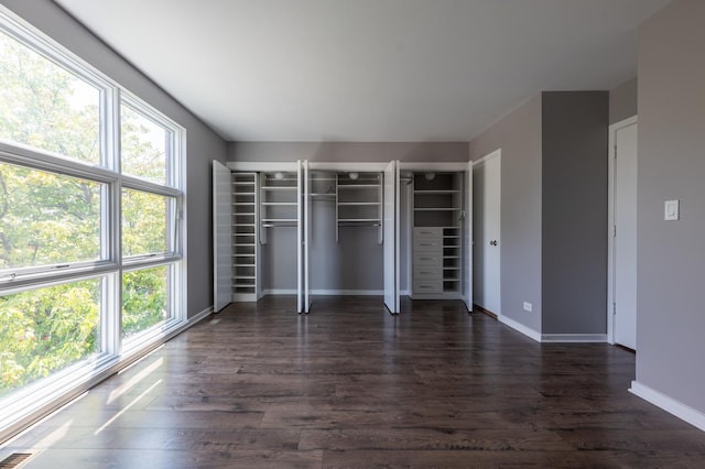 937 W Wrightwood Ave Unit C, Chicago, IL 60614 - unfurnished bedroom with dark wood-style floors and baseboards