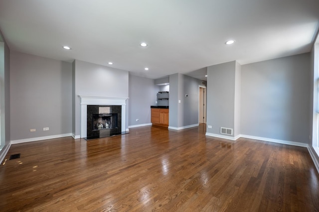 937 W Wrightwood Ave Unit C, Chicago, IL 60614 - unfurnished living room with dark wood-style floors, recessed lighting, and a fireplace