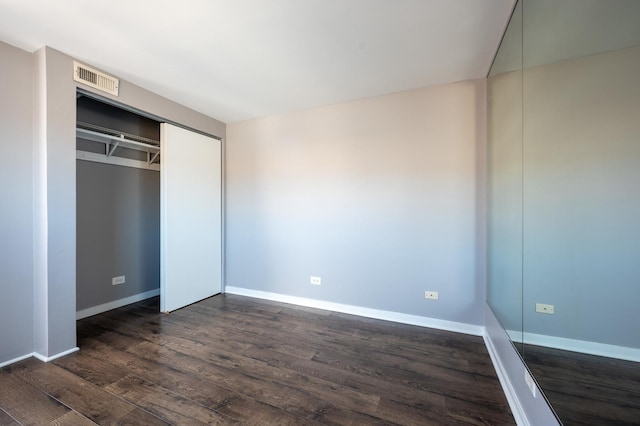 937 W Wrightwood Ave Unit C, Chicago, IL 60614 - unfurnished bedroom with dark wood finished floors and a closet