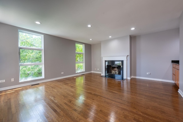 937 W Wrightwood Ave Unit C, Chicago, IL 60614 - unfurnished living room featuring dark wood-type flooring, recessed lighting, and a fireplace