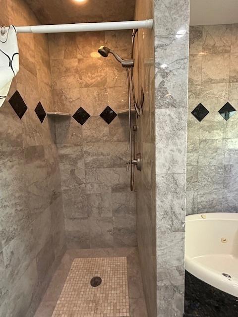 2277 S Westwood Ln, Palatine, IL 60067 - bathroom with a tub with jets and a tile shower