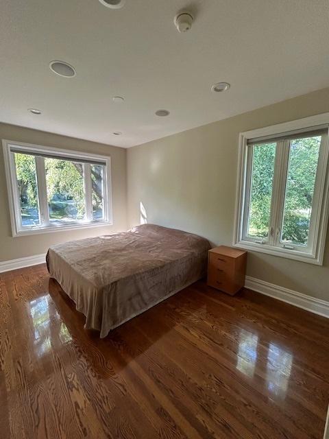2277 S Westwood Ln, Palatine, IL 60067 - bedroom with wood finished floors and recessed lighting