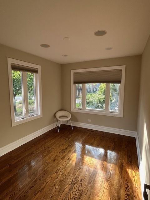 2277 S Westwood Ln, Palatine, IL 60067 - spare room with dark wood-type flooring