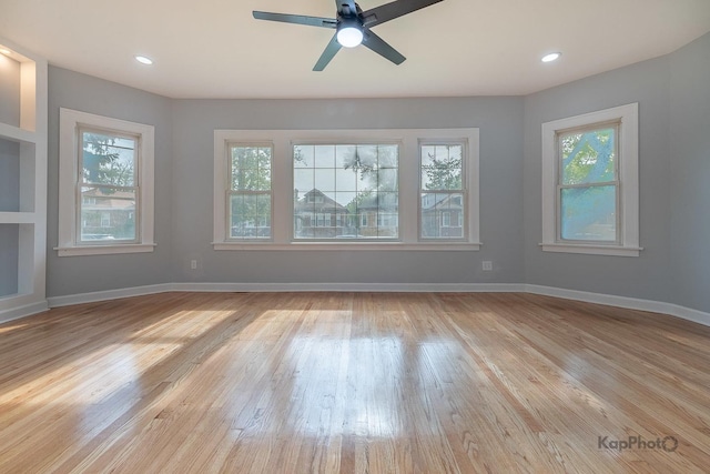 9340 S Elizabeth St, Chicago, IL 60620 - unfurnished living room featuring light wood-style floors and ceiling fan