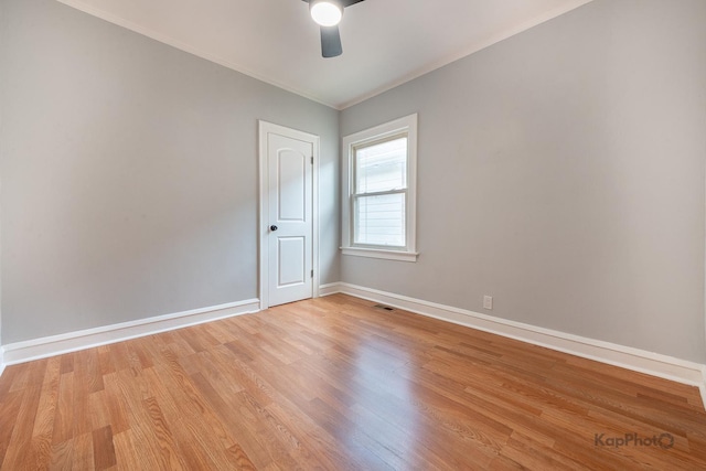 9340 S Elizabeth St, Chicago, IL 60620 - unfurnished room featuring a ceiling fan, light wood-type flooring, and ornamental molding