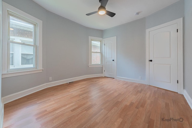 9340 S Elizabeth St, Chicago, IL 60620 - unfurnished bedroom with light wood finished floors and a ceiling fan