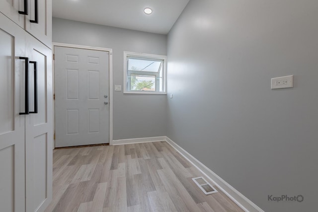 9340 S Elizabeth St, Chicago, IL 60620 - doorway featuring light wood-style floors and recessed lighting