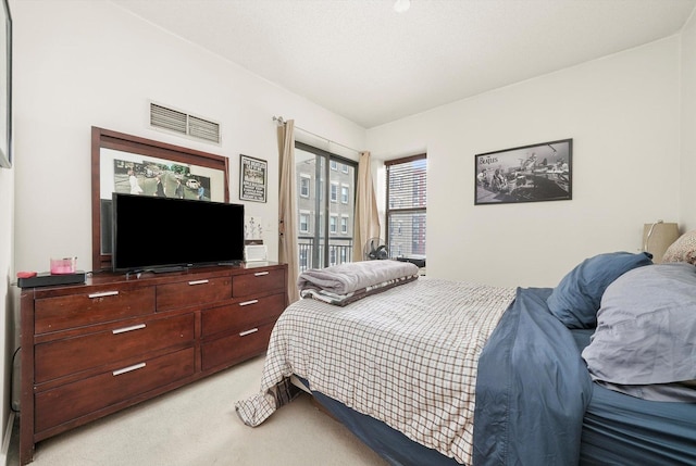 41 E 8th St Unit 1404, Chicago, IL 60605 - bedroom featuring access to outside and light colored carpet