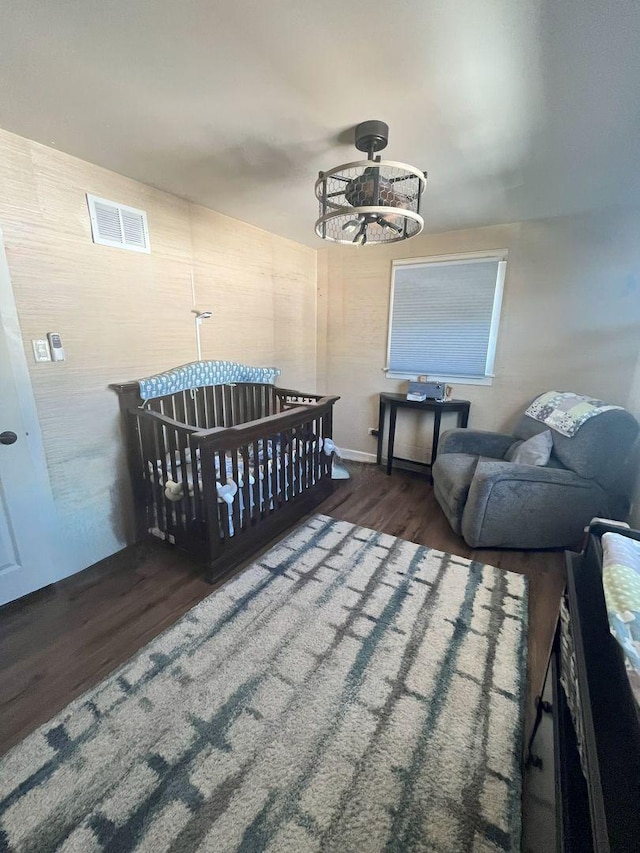 5428 138th St, Crestwood, IL 60418 - bedroom with wood finished floors and a chandelier