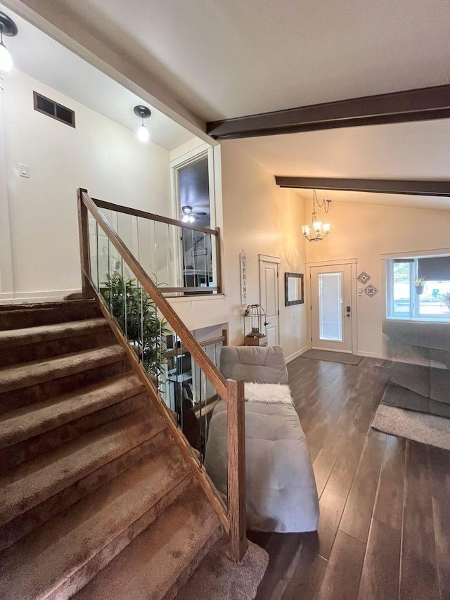 5428 138th St, Crestwood, IL 60418 - stairway featuring wood finished floors and a chandelier