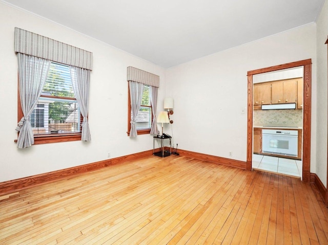 31 Bluff Ave, La Grange, IL 60525 - empty room featuring hardwood / wood-style floors and ornamental molding