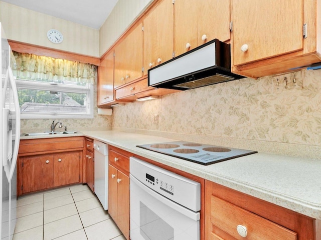 31 Bluff Ave, La Grange, IL 60525 - kitchen featuring white appliances, light countertops, light tile patterned floors, exhaust hood, and wallpapered walls