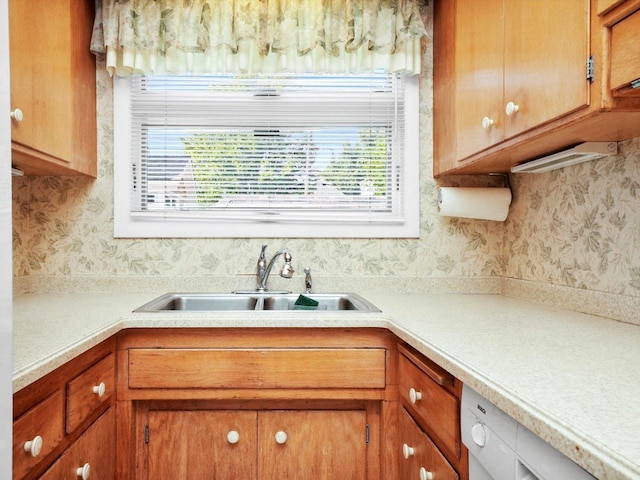 31 Bluff Ave, La Grange, IL 60525 - kitchen with light countertops, wallpapered walls, healthy amount of natural light, and brown cabinets
