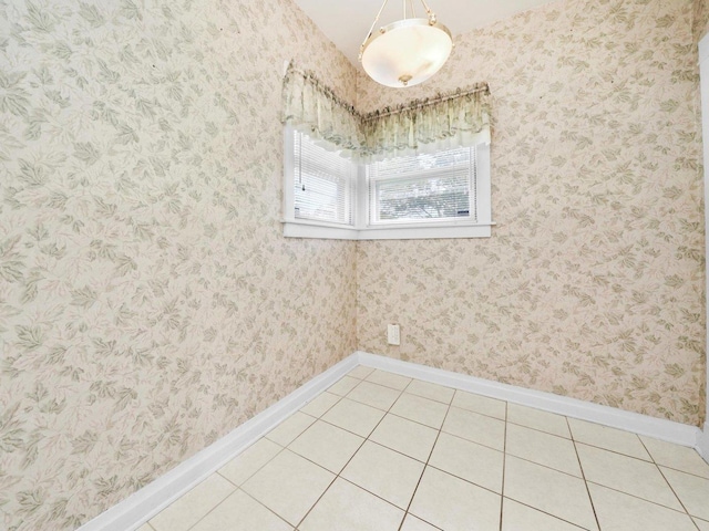 31 Bluff Ave, La Grange, IL 60525 - empty room featuring baseboards and light tile patterned floors