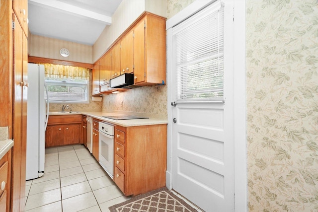 31 Bluff Ave, La Grange, IL 60525 - kitchen featuring wallpapered walls, white appliances, light tile patterned flooring, plenty of natural light, and light countertops