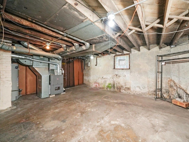 31 Bluff Ave, La Grange, IL 60525 - unfinished basement featuring heating unit and electric water heater