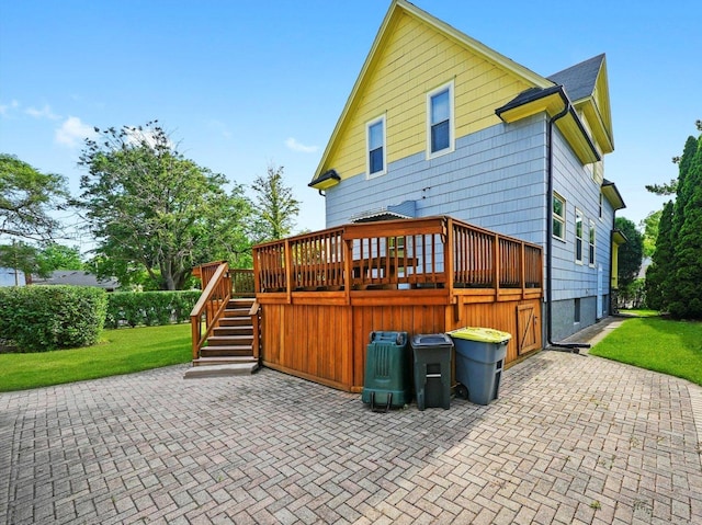 31 Bluff Ave, La Grange, IL 60525 - back of property with a patio, a wooden deck, a lawn, and stairs