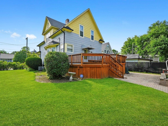 31 Bluff Ave, La Grange, IL 60525 - rear view of house featuring a deck, a patio area, stairway, and a chimney