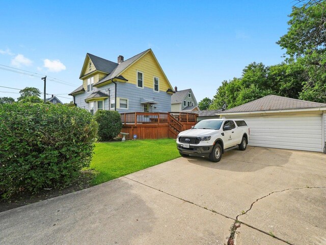 31 Bluff Ave, La Grange, IL 60525 - view of side of home with a deck, a yard, and a garage