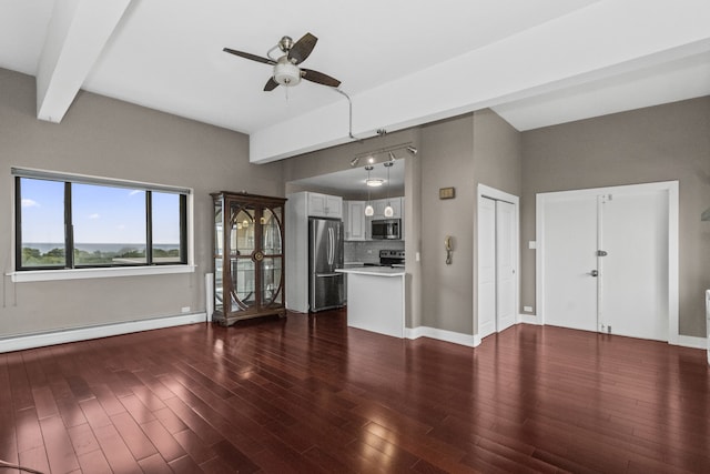 5048 N Marine Dr Unit A9, Chicago, IL 60640 - unfurnished living room featuring ceiling fan, baseboard heating, dark wood-style floors, and beamed ceiling