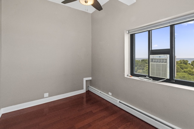 5048 N Marine Dr Unit A9, Chicago, IL 60640 - empty room featuring a baseboard heating unit, wood finished floors, a ceiling fan, and cooling unit