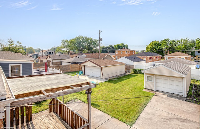 3855 W 107th St, Chicago, IL 60655 - view of yard featuring a residential view, a detached garage, and an outbuilding