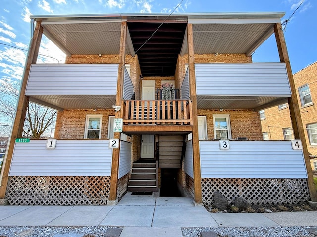 9003 Bronx Ave, Skokie, IL 60077 - rear view of property featuring brick siding and a balcony