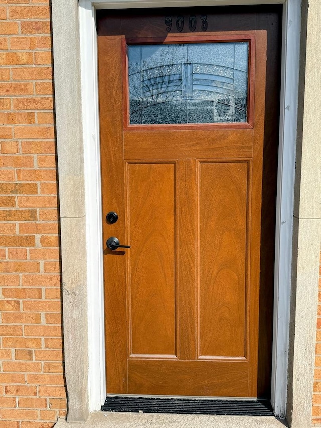 9003 Bronx Ave, Skokie, IL 60077 - view of exterior entry featuring brick siding