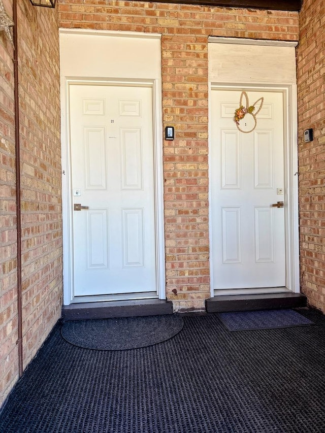 9003 Bronx Ave, Skokie, IL 60077 - view of exterior entry featuring brick siding and covered porch